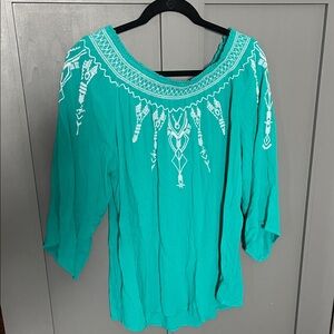Chic Turquoise Blouse with White Embroidery